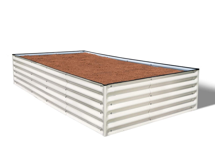 Raised garden bed, rectangular, ivory color, filled with brown soil on a white background