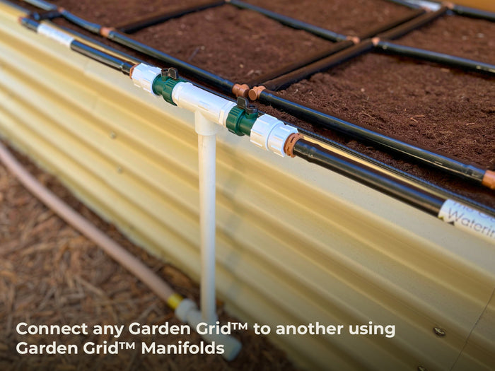Garden Grid Manifolds connecting two Garden Grids on a raised garden bed