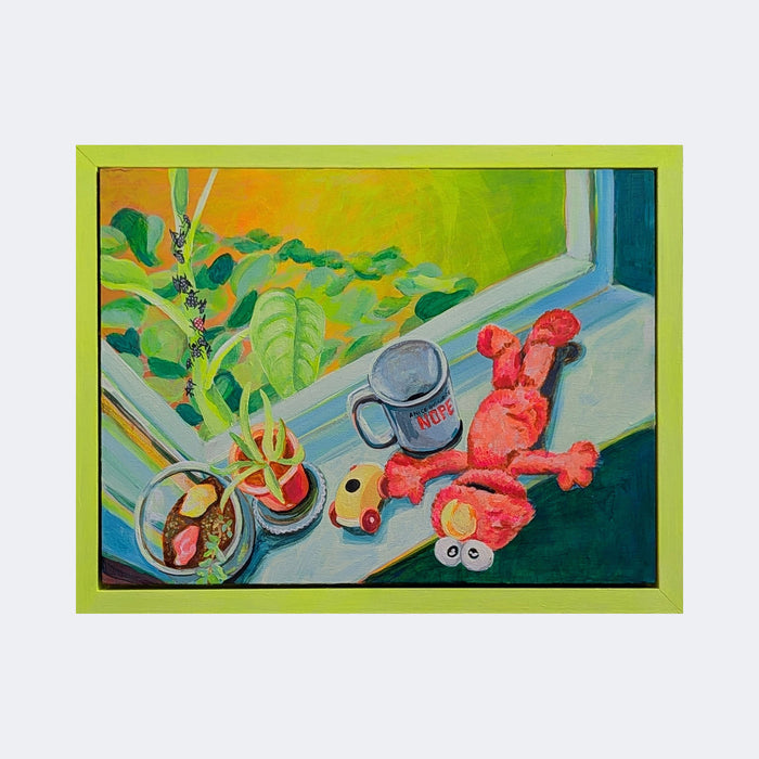 The artwork "And Then She Became the Tree of Heaven" by Mary Younkin depicts a vibrant windowsill scene rendered in acrylic on wood panel. Featuring bright green foliage outside, a playful red plush toy, a grey mug with the word "NOPE," and colorful small objects, the style evokes the vivid everyday realism found in works by artists like David Hockney.