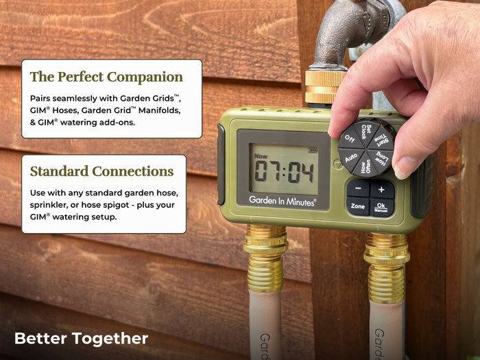 Hand adjusting a Garden In Minutes watering timer connected to two hoses